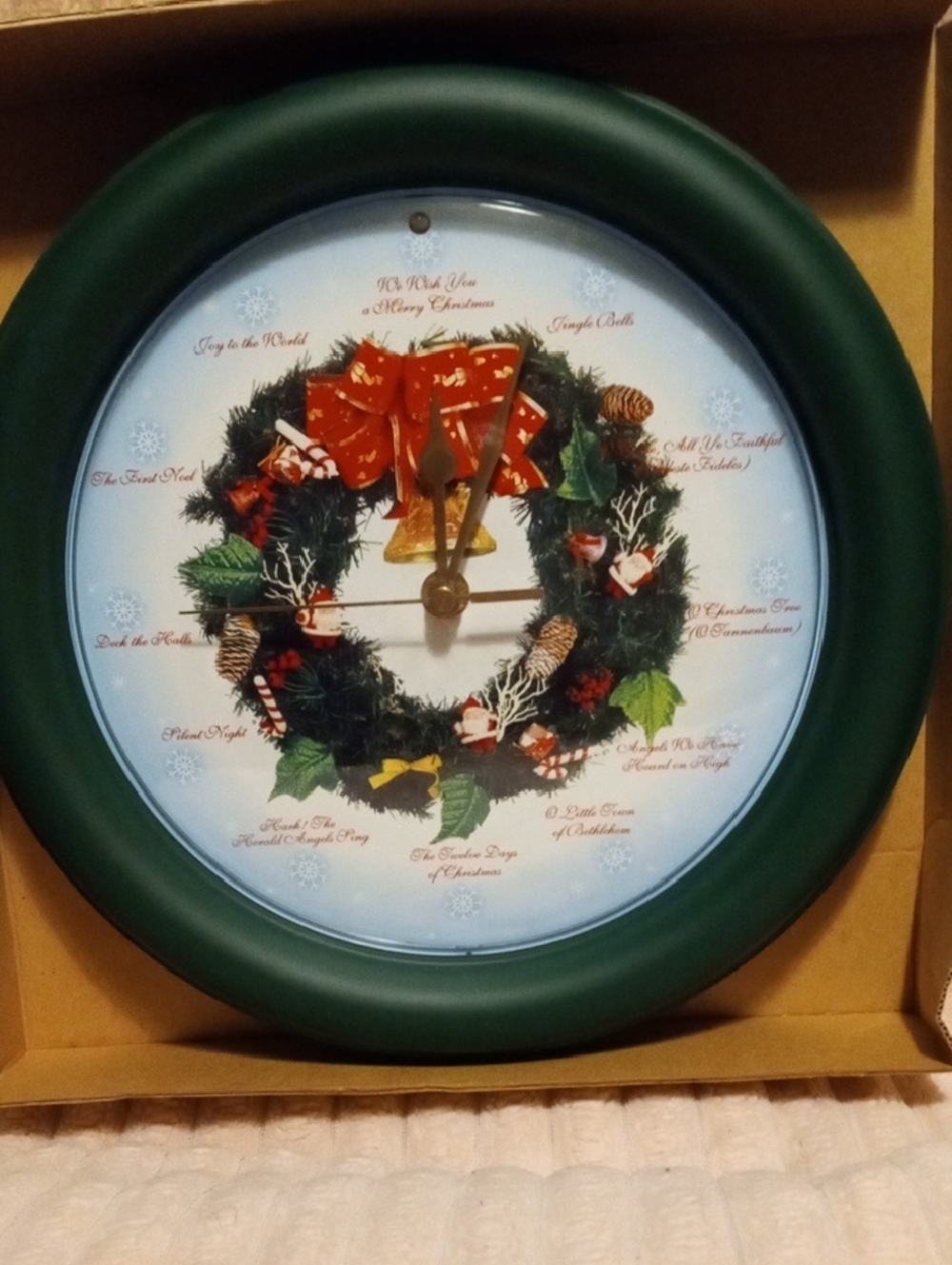 Festive Green Holiday Wreath Wall Clock with Ribbon Accent